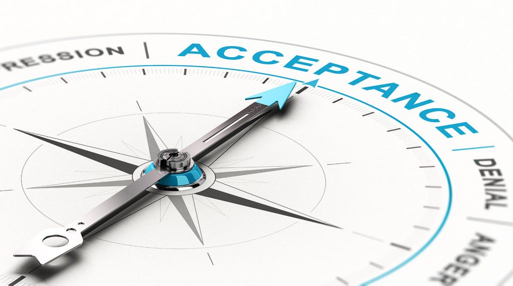 a compass pointing to accept