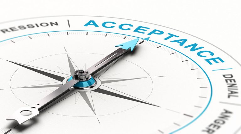 a compass pointing to accept