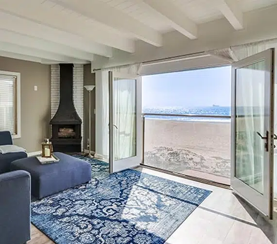 a living room with a fireplace and a couch